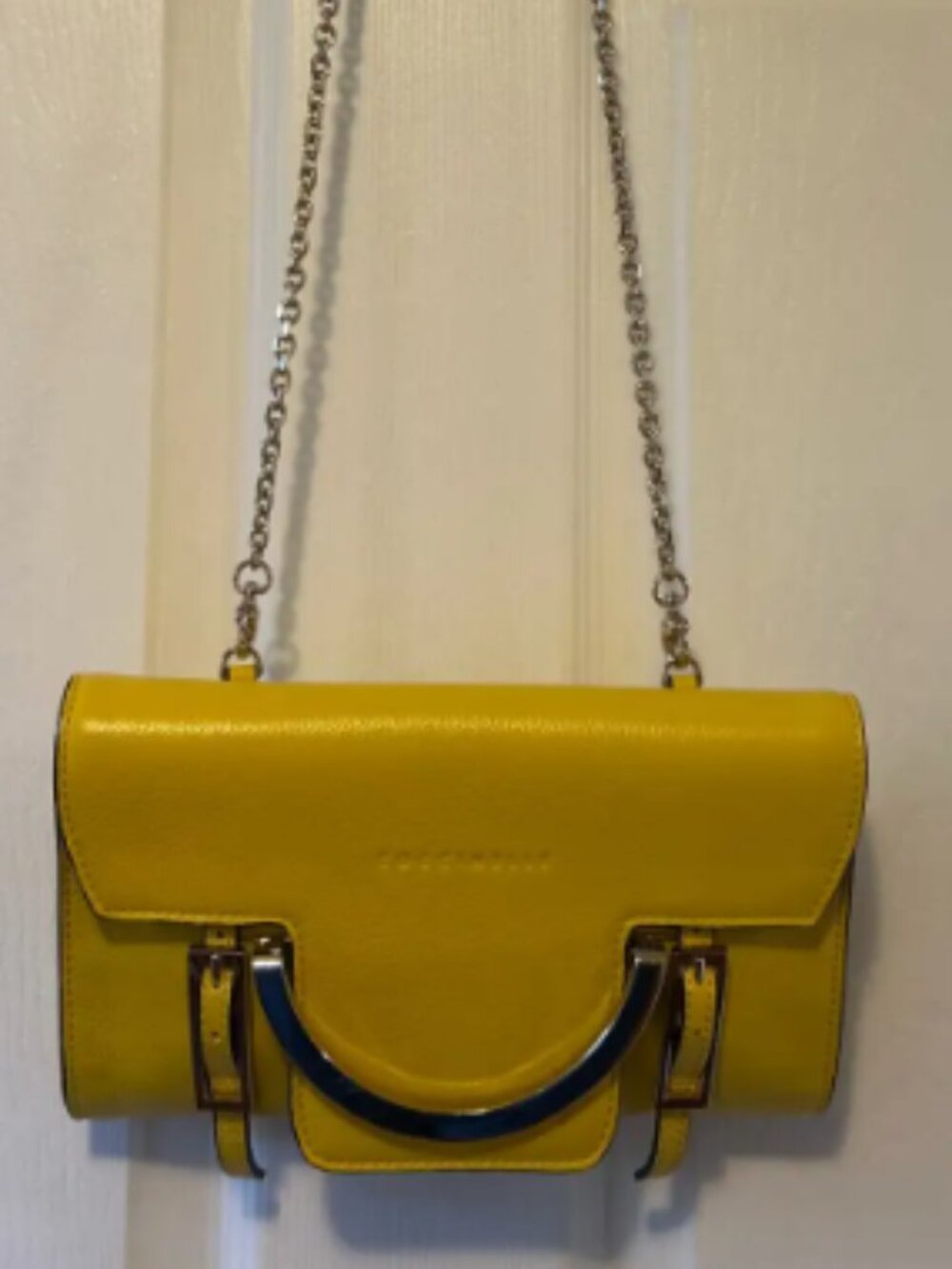 Small yellow handbag by Coccinelle